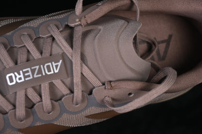 Adizero EVO SL Charcoal Coffee Met. Aurora Black