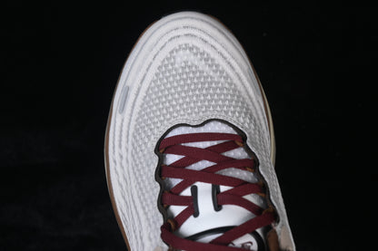 Vomero Plus Sail and Baroque Brown