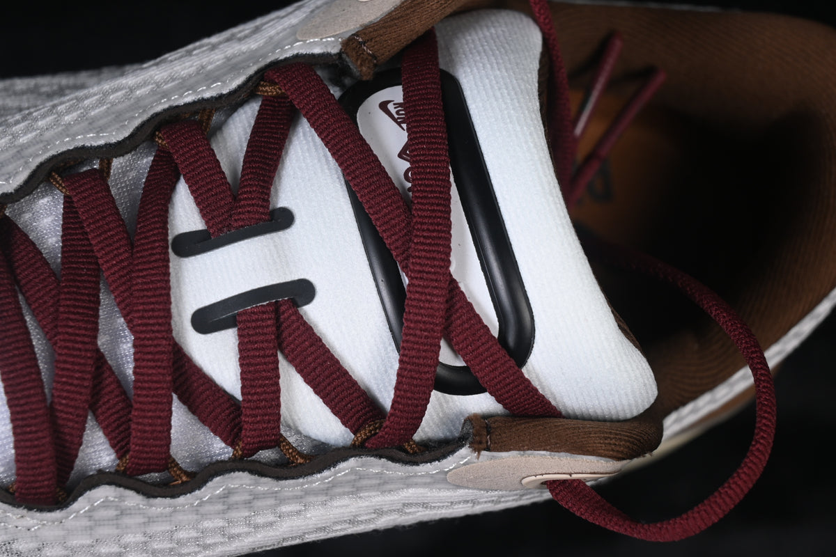 Vomero Plus Sail and Baroque Brown